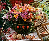 Moss-lined iron basket with florist's foam