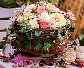 Roses and rose hips, ornamental cabbage, Gypsophila, Dianthus