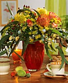 Arrangement of Protea flowers, dill, roses & Eucalyptus leaves