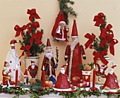 Father Christmases on mantelpiece