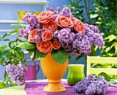 Arrangement of roses and lilac
