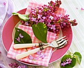 Place-setting decorated with lilac