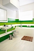 A green and white bathroom