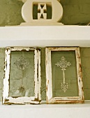 Framed examples of silversmith's work