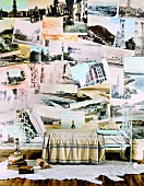 Ornate metal bed against wall with crazy photo wall mural of buildings and seascapes
