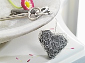 Stone heart encased in crocheted silver wire (keyring)