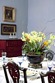 Orchids on laid dining table