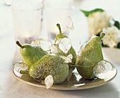 Pears on a plate with 'silver pennies'
