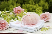 Bath sponge with roses and lady's mantle