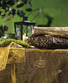 Table with decorative items in sumptuous fabrics