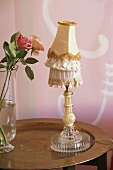 Table lamp and rose
