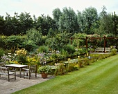 Garden with pond, lawn and terrace