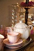 Teapot, cups and saucers on tray