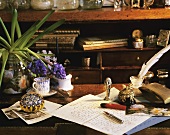 Antique desk with a letter and writing instruments