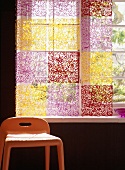 Window with colourful curtain