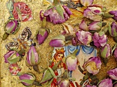 Dried rosebuds on a fairytale picture