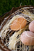 Artifical eggs in Easter nest