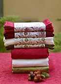 Assorted tablecloths and fabric napkins