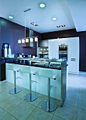Kitchen with breakfast bar and bar stools