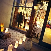 House entrance decorated with luminarias for a party