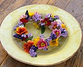Heart-shaped wreath of primulas and forget-me-nots
