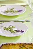Place-setting decorated with herbs