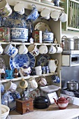 A kitchen dresser with old fashioned crockery