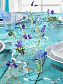 Turquoise table with spring flowers