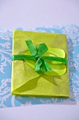 Green envelope with bow