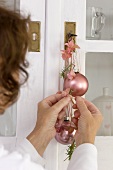 Making decoration with Christmas baubles & hydrangea flowers