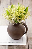 Lilies of the valley in a jug