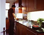 A man in a kitchen