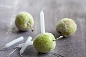 Sugared apples with candles