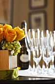 Yellow Rose Arrangement with Glasses and Sparkling Wine Set for a Special Occasion