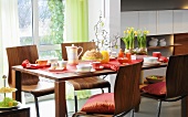 Easter breakfast on a dining table, table and chairs made from walnut wood