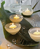 Floating candles in small bowls