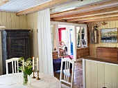 An open-plan dining room-cum-living room in a country house