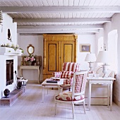 A living room with a fireplace in a 19th century German house decorated in Scandinavian style
