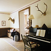 A piano in a hunting room