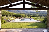 A view of a garden with a pool in the Mediterranean countryside