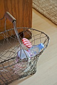 Bottle and jar in wire basket