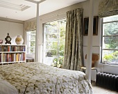 Bedroom in a country home with an open terrace door