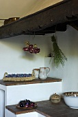 A shelf in a rustic kitchen