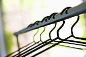 Clothes rail with coat hangers