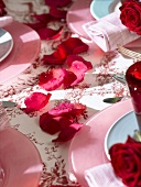 Red rose petals (table decoration)