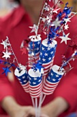 Woman holding decorations for the 4th of July (USA)