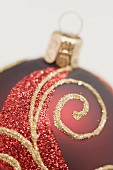 Red Christmas bauble with gold design (detail)