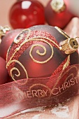 Red Christmas bauble and ribbon