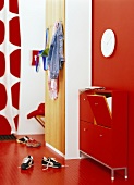 Red shoe cabinet in hall