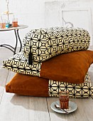 Oriental-style cushions & bolster